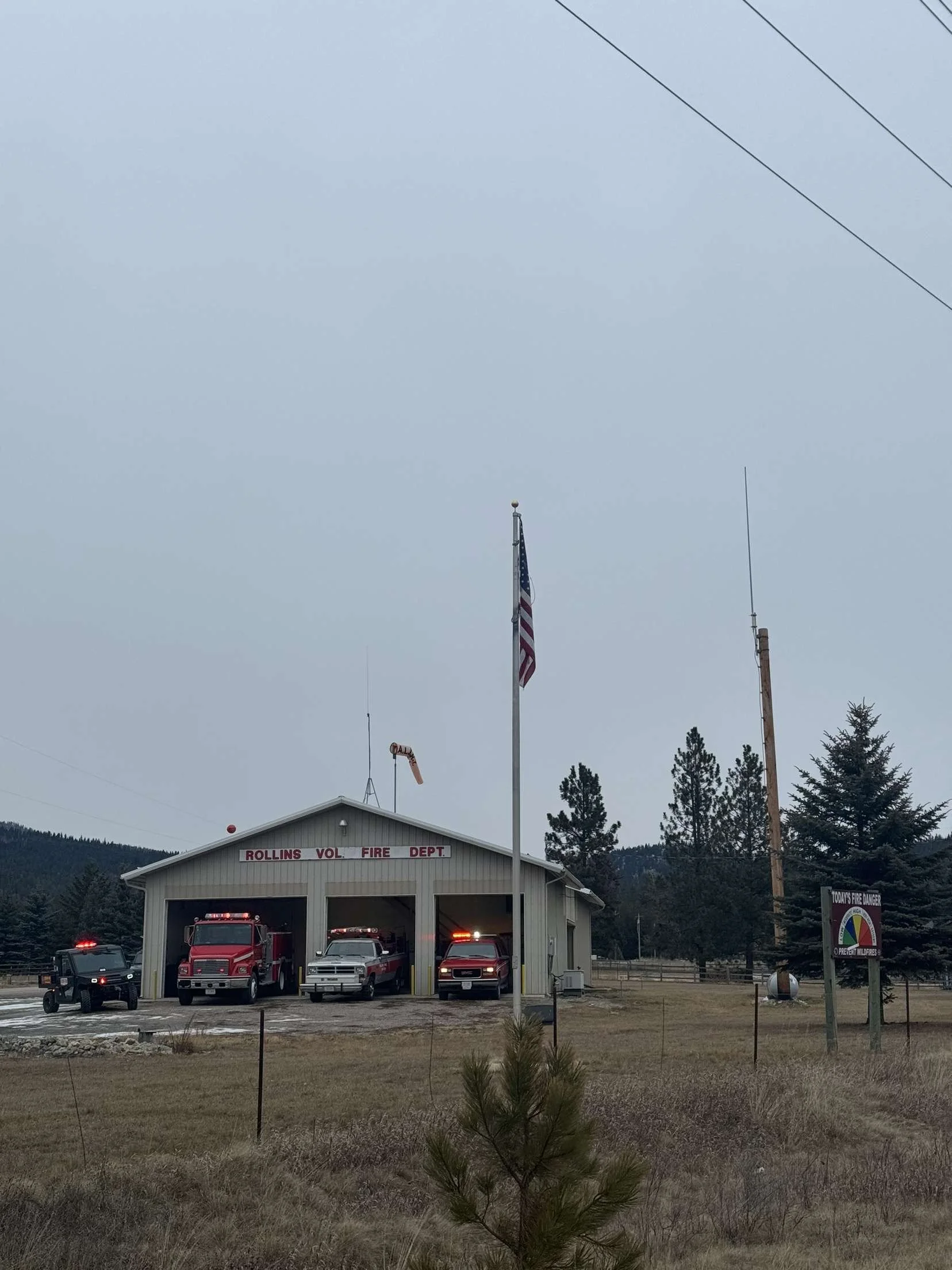 The Rollins fire hall and flagpole