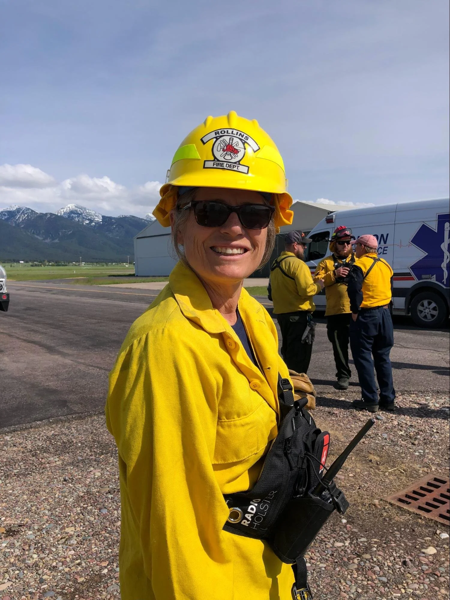 A Rollins volunteer in wildland gear